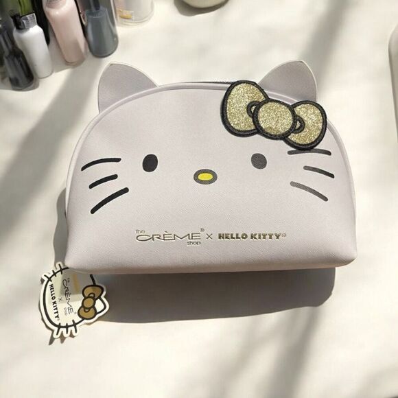 Hello Kitty x The Crème Shop Dome Makeup Travel Pouch (Gold Bow) NWT - Picture 1 of 3